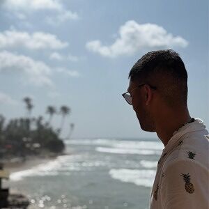 Kalinga, photographed in profile looking out over a coastline.
